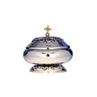 Smooth silver ciborium with liturgical elements in relief