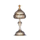 Embossed silver ciborium with acorn-shaped knot