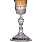 Silver chalice with circular base and acorn knot