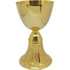 Chalice and paten of Communion in gold metal