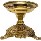 Table candlestick with liturgical motifs on the base