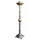 Candlestick made of cast iron and gold and silver metal