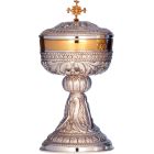 Sterling silver ciborium with embossed liturgical elements