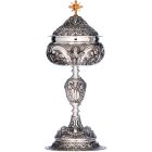 Silver ciborium with cherub faces in relief