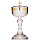 Smooth silver ciborium with overflowing cup