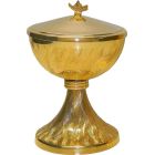 Metal ciborium decorated with wavy lines