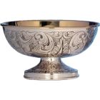 Embossed silver paten