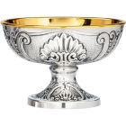 Silver paten with elements in relief