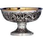 Silver paten with embossed exterior decoration