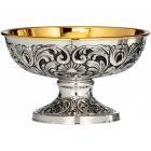 Silver paten with embossed exterior decoration
