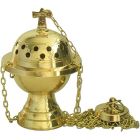 Small golden metal censer