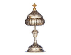 Embossed silver ciborium with acorn-shaped knot