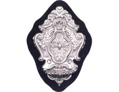 Silver shrine with liturgical elements in relief