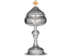 Silver ciborium with chiselled base, knot and cup