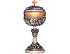 Silver ciborium with liturgical elements in relief