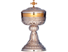 Sterling silver ciborium with embossed liturgical elements
