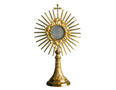 Monstrance in golden metal with rays and Cross