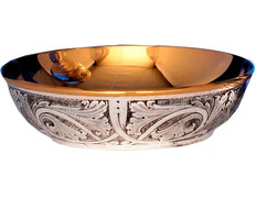 Embossed silver paten with gold interior