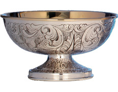 Embossed silver paten