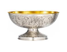Embossed silver paten