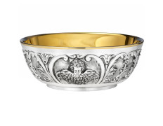 Silver paten with embossed angel face