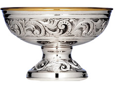 Chiselled and embossed sterling silver paten