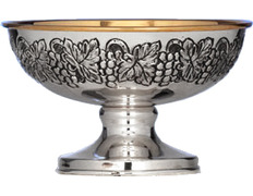 Silver paten with chiselled bunches of grapes