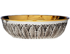 Silver paten without base with decoration in relief