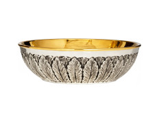 Silver paten without base with decoration in relief