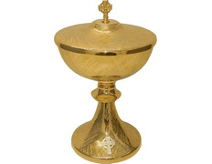 Golden metal ciborium with silver Cross