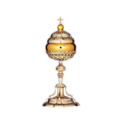 Silver ciborium with golden cross