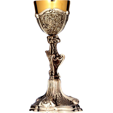 Asymmetrical silver chalice with chiselled liturgical elements