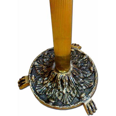 Standing candlestick with gold decorated base and tray