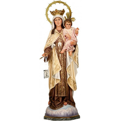 Virgen del Carmen decorated with a crown of paste wood, a golden metal halo...