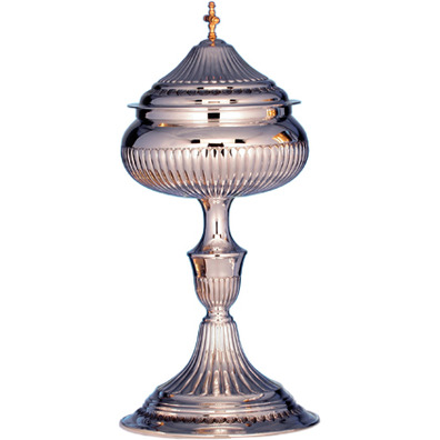 Chiselled silver ciborium with golden cross