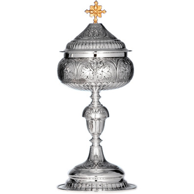 Silver ciborium with chiselled base, knot and cup