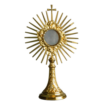 Monstrance in golden metal with rays and Cross