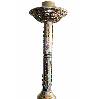 Candlestick made of cast iron and gold and silver metal