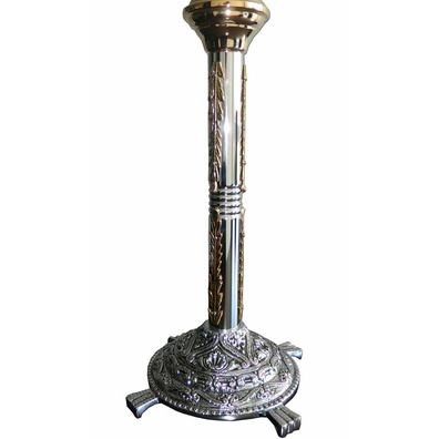 Candlestick made of cast iron and gold and silver metal