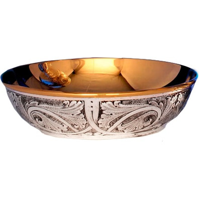 Embossed silver paten with gold interior
