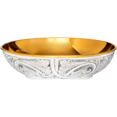 Embossed silver paten with gold interior