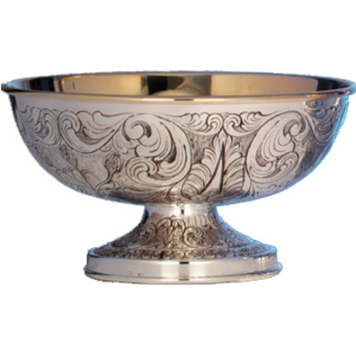 Embossed silver paten