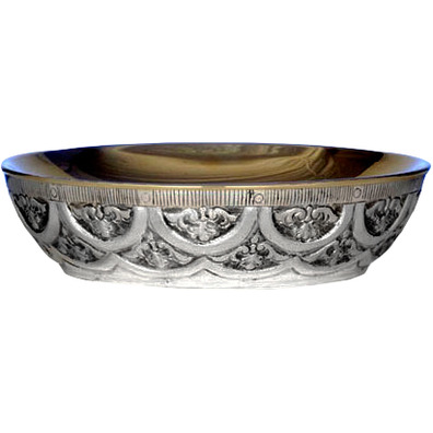 Silver paten with liturgical elements in relief