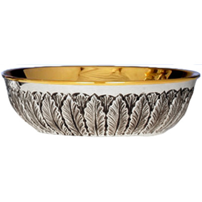 Silver paten without base with decoration in relief