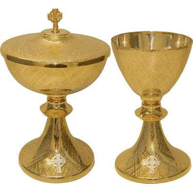 Gold metal chalice with silver Cross