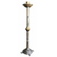 Candlestick made of cast iron and gold and silver metal