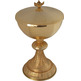 Religious ciborium in golden metal