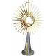 Cast monstrance with golden angel