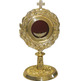 Reliquary - monstrance in gilt metal with relief decoration