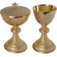 Gold metal chalice with paten